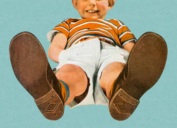 widok chłopiec z nogami do góry - staromodny ilustracje stock illustrations