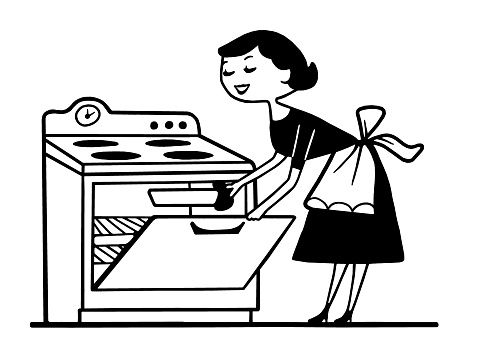Woman Taking Food out of the Oven