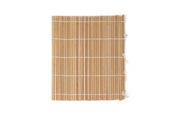 istock Bamboo wood craft roll sushi on white background 1320752747