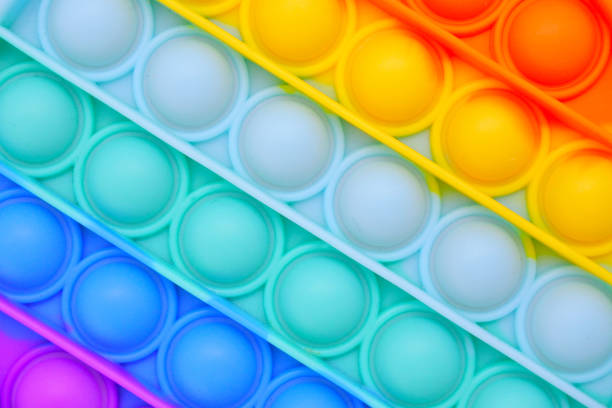 istock Push pop it  Bubble Fidget Sensory Toy Background 1320755483