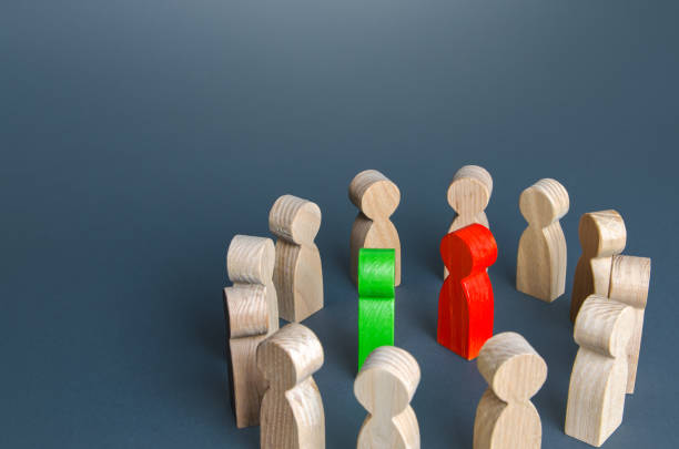 istock Two rivals surrounded by people. Rivalry, struggle for leadership. Conflict resolution through negotiations. Political debate. Public discussion. Competition for supremacy. Fight concept 1320756067
