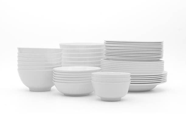 istock set clean dishes glasses on white background 1320757837