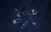 Round glass with light dispersion, 3d rendering.