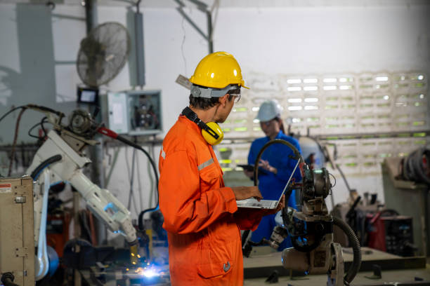 istock Industrial factories that use robots to work. Digital manufacturing operation. Industry 4.0 1320766003