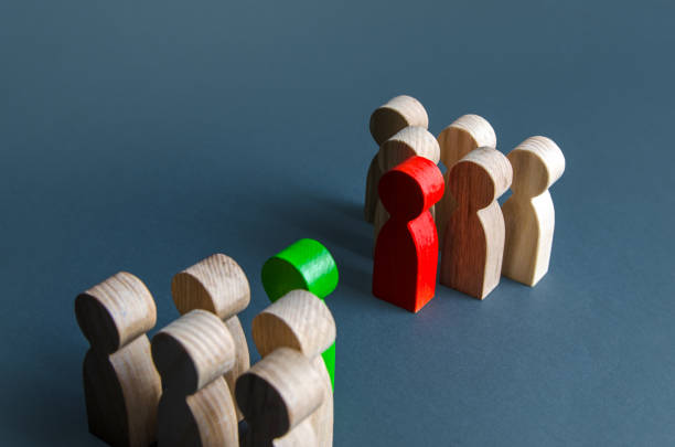 istock Conflict between teams. Resolution of conflict through negotiations. Mediation and Arbitration. Search for compromise. Concluding a truce, end of confrontation. Rivalry, struggle for leadership. 1320770000