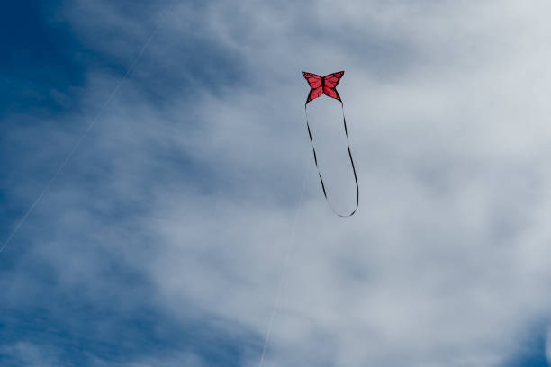 istock Colorful Kites flying over the sky 1320776661