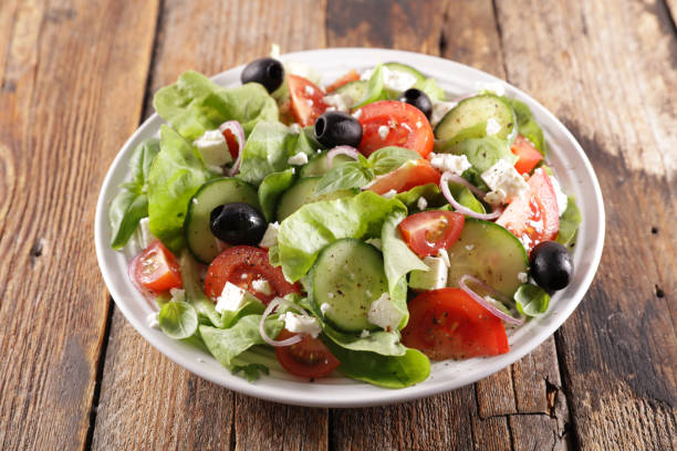 istock vegetable salad with cucumber, tomato , cheese and olive 1320781439