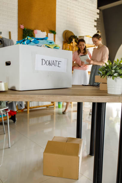 istock Donation box full with clothes ready for charity 1320782807