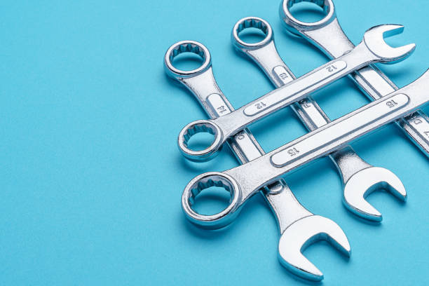 istock Set of spanners and wrenches on color background 1320785767