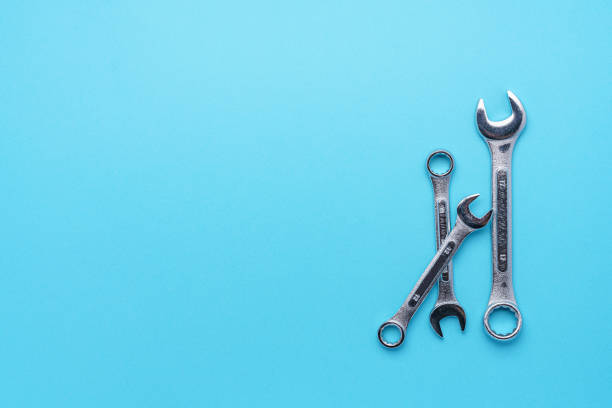 istock Set of spanners and wrenches on color background 1320785777