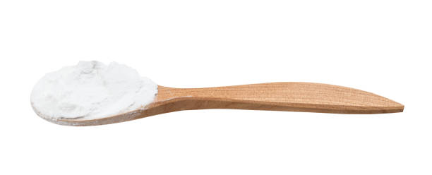 istock potato starch in wooden spoon isolated 1320786968