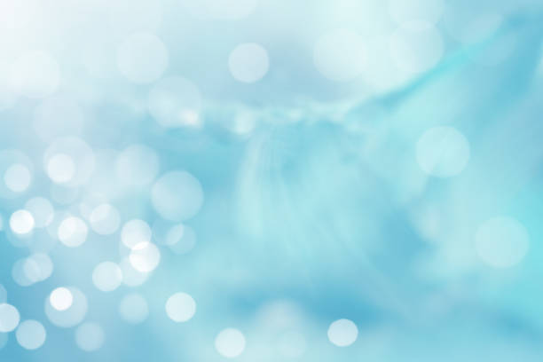 Beautiful nature bokeh with sunlight on the waves. Abstract background.