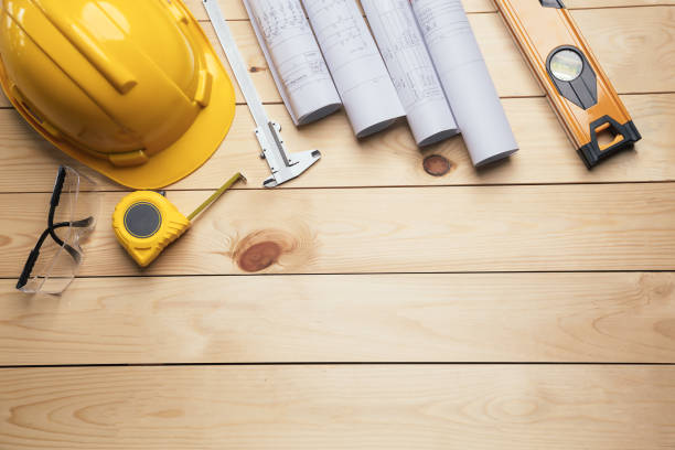 istock Work safety. Standard Construction site protective equipment on  top view wooden background, flat lay, copy space,safety first concepts. 1320788120