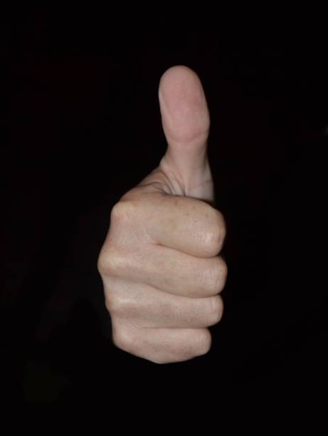 istock A thumb signal,  thumbs-up real human hand 1320788693