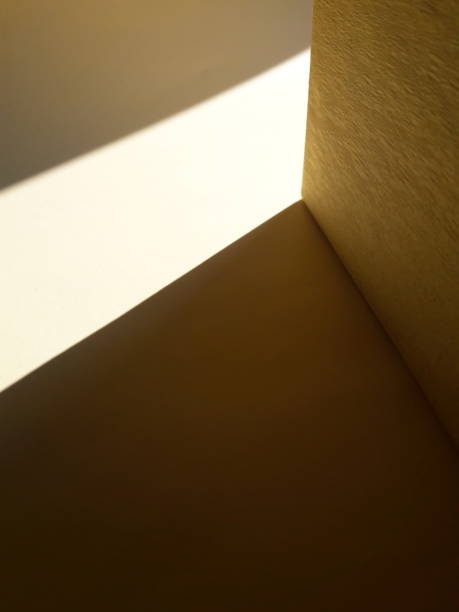 istock photo of shadow texture on yellow background 1320788961