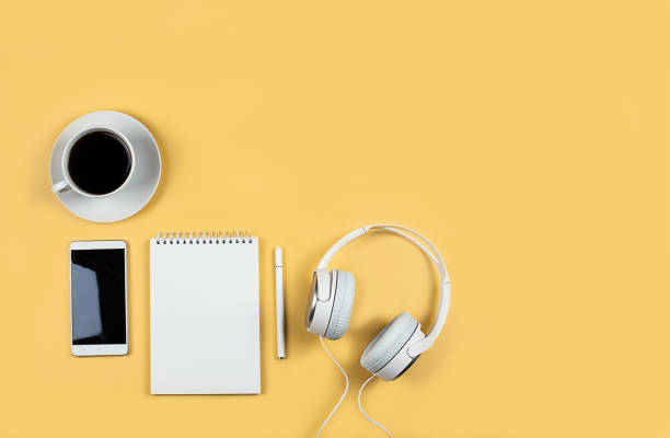 istock Flat layout on yellow background. Horizontal photo. Composition concept online conference, desktop, work from home and learning, concept blogging, online education 1320790943