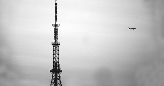 A cellphone tower in Chennai with a plane