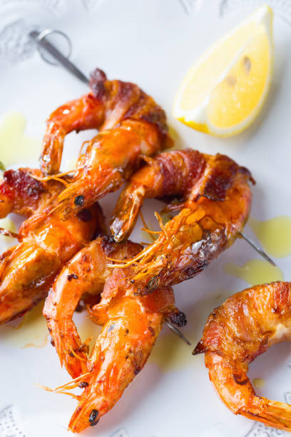 istock grilled bacon wrapped prawn shrimp seafood 1320795881