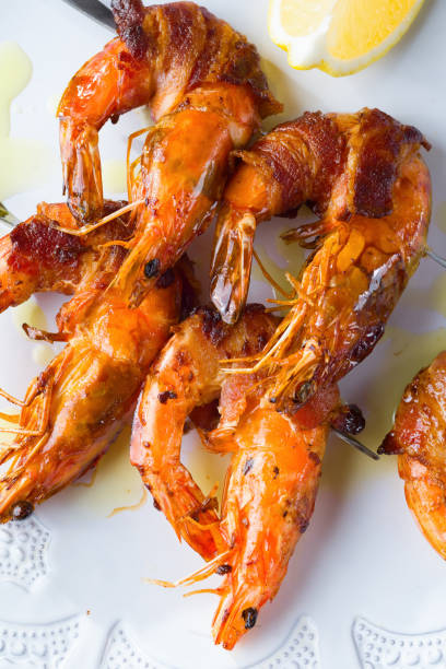 istock grilled bacon wrapped prawn shrimp seafood 1320795889