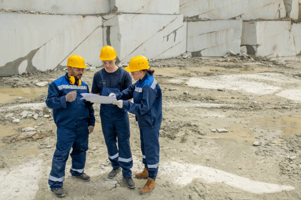 istock One of modern builders pointing at sketch of construction 1320797819