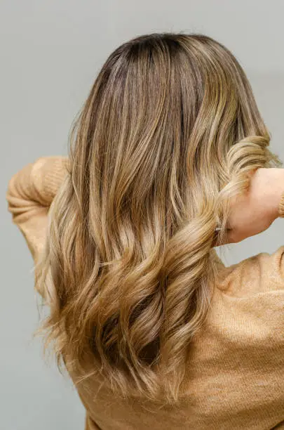 Modern trendy Air Touch or Ombre technique for hair dyeing. Natural look