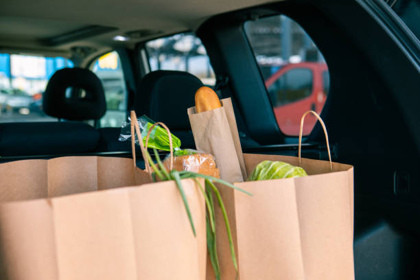 istock bags with products in car trunk 1320798907