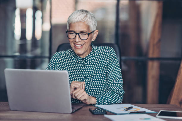 istock Senior businesswoman having a video call 1320799225