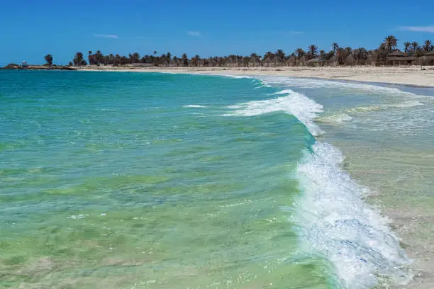 Seascape. Wonderful view of the lagoon, seashore, white sand beach and blue sea. Djerba Island, Tunisia