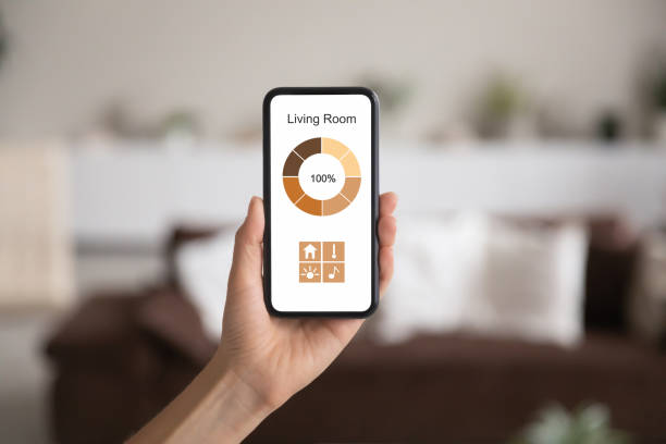 istock Close up of person use smart home application on gadget 1320801483