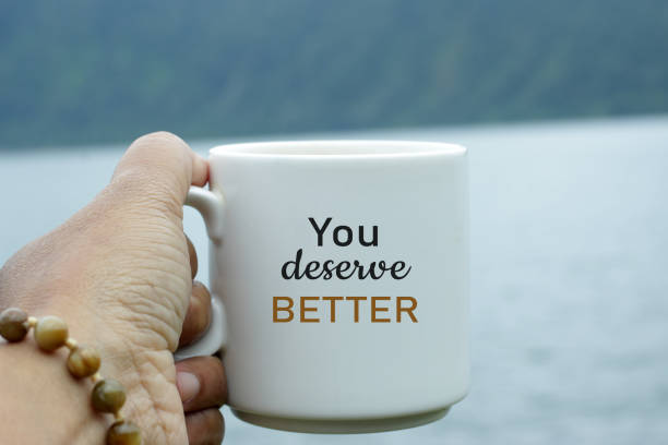 istock Message on coffee cup in hand - You deserve better. 1320801567
