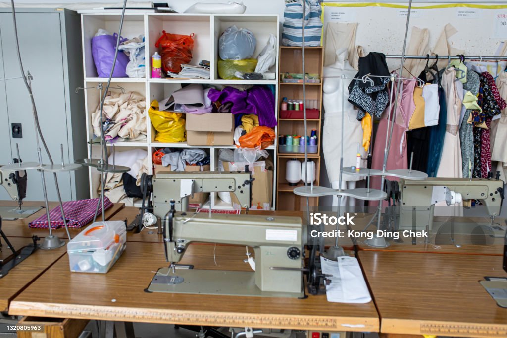 Fashion design college classroom workshop with sewing machine Education Stock Photo