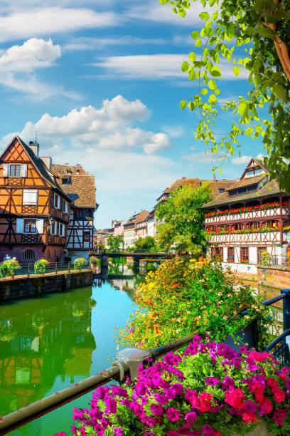 Houses on river in Strasbourg Picturesque district Petite France in Strasbourg, houses on river petite france strasbourg stock pictures, royalty-free photos & images