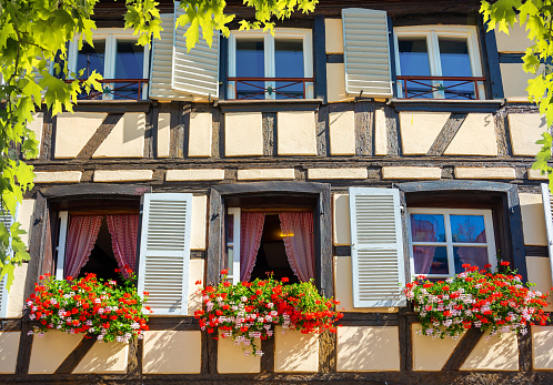 Wall and windows of traditional old house in Strasbourg, France