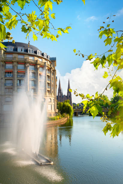 Fountain in strasbourg Canal des faux Remparts Esca building Strasbourg, France petite france strasbourg stock pictures, royalty-free photos & images