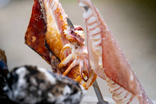 istock traditional grilled calamari cooked on the beach 1320810420