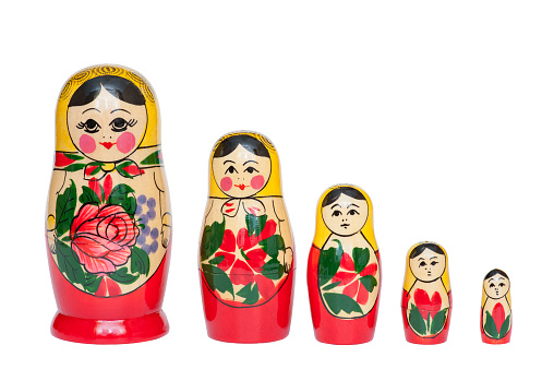 Original Babushka or Matryoshka Nesting Russian Dolls. Colorful, hand painted nesting dolls - traditional symbol of Russia. Photo was taken in old bazaar in Moscow, Russia.