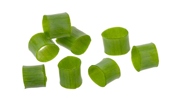 istock close up of green onion slice on white background 1320815569