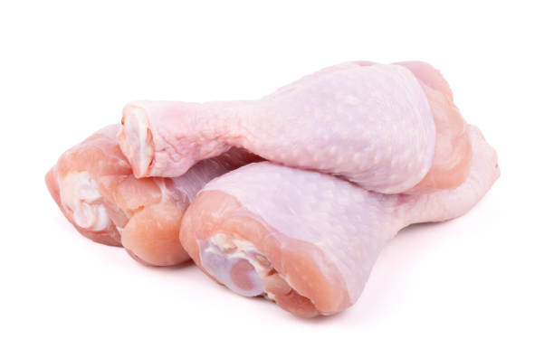 istock group of raw chicken drumsticks isolated on white background 1320815632