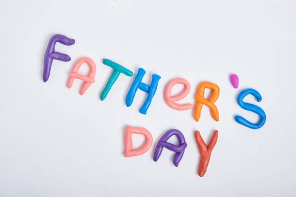 istock the inscription father's day from plasticine on a gray background 1320817292