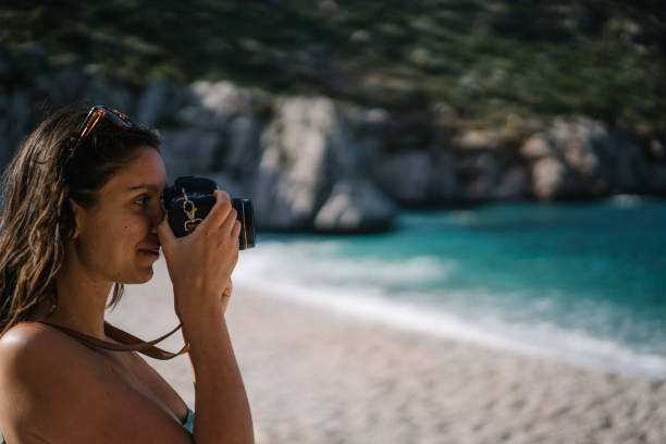 She takes photos of coastline in the distance