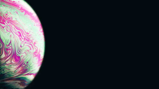 istock Bubble color. Globe planet earth in galaxy universe space with abstract sun on black background. Color abstract fluorescent inks in water. 1320832262