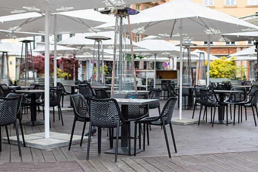 Tables of traditional outdoors cafe in European city