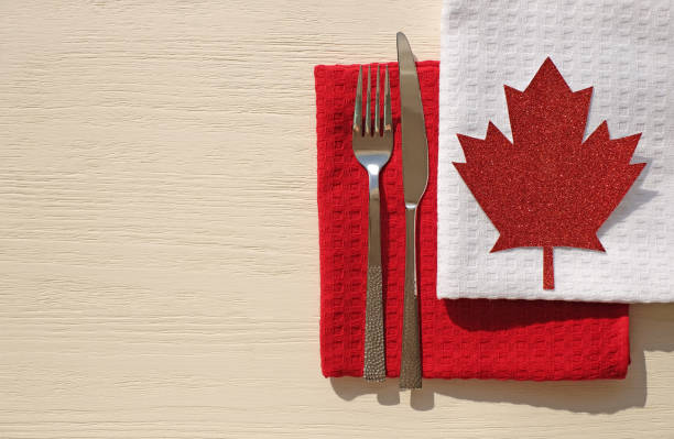 istock Table setting in the style of Canada colors, outdoors, top view, copy space 1320840874
