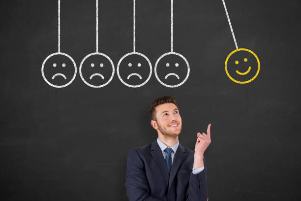 istock Hand Drawing Unhappy and Happy on Blackboard 1320841959