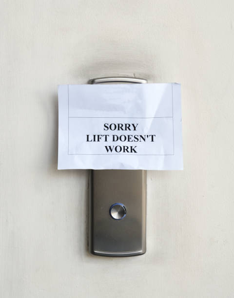 The inscription on the call button of the elevator, sorry, the elevator does not work.