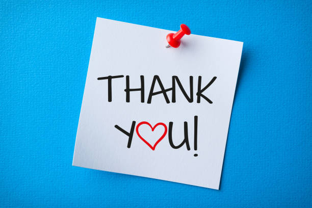 istock White Sticky Note With Thank You And Red Push Pin On Blue Background 1320842283