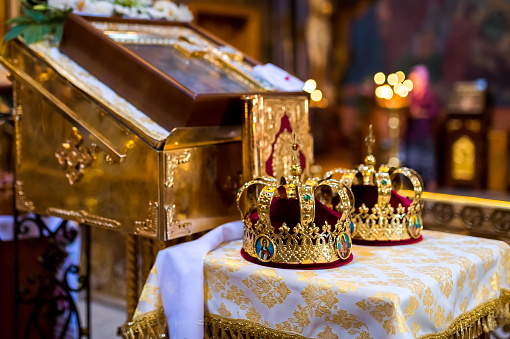 Golden church king crowns. Marriage ceremony crowns.