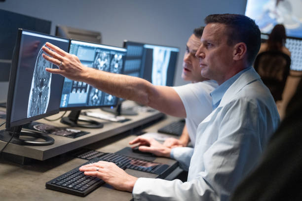 istock Two doctors exchanging opinions on MRI scan results. 1320844533