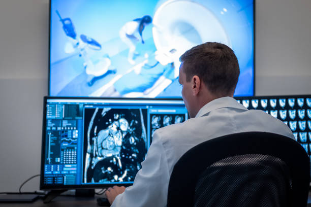 istock Radiologist during magnetic resonance imaging scanning. 1320844534