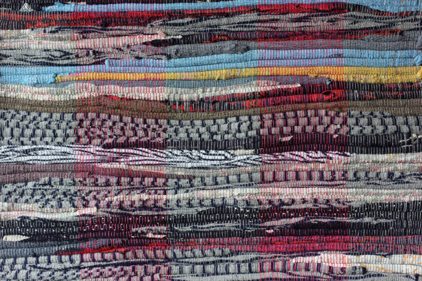 istock striped cotton rug in folk style. 1320847621